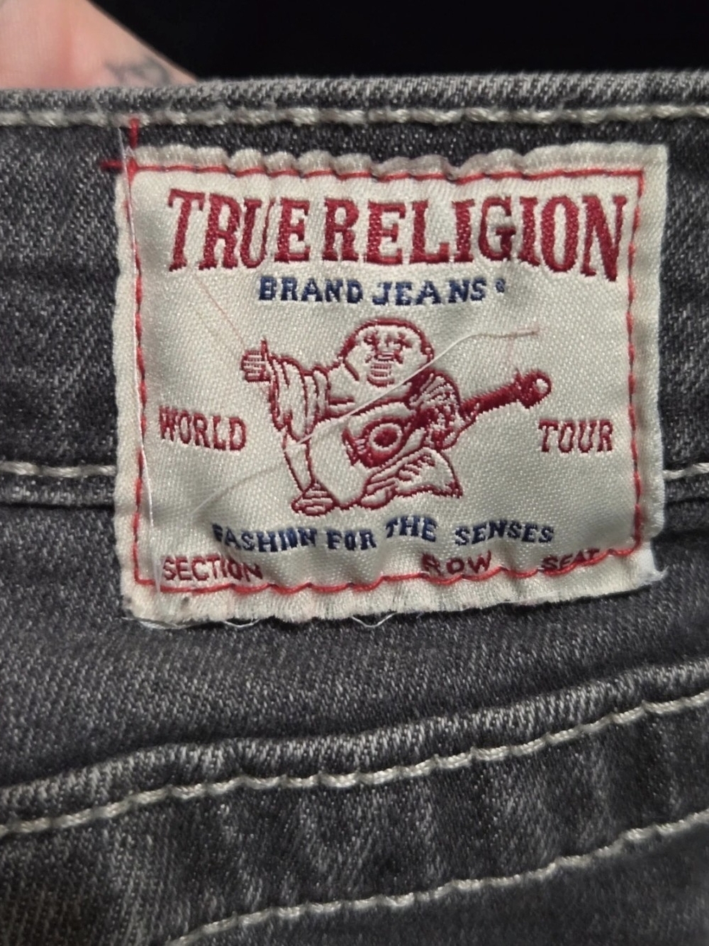 True Religion Men's Dark Gray Slim Jeans with Red Logo Patch